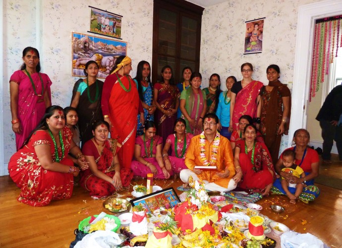 The women’s festival, called Teej, is celebrated in the traditional way at the home of the Hindu priest, Mr. Ganga Rijal. Women pray for the long-life and happiness of their husbands and themselves. August, 2012. Photographer: Mukti Rijal.