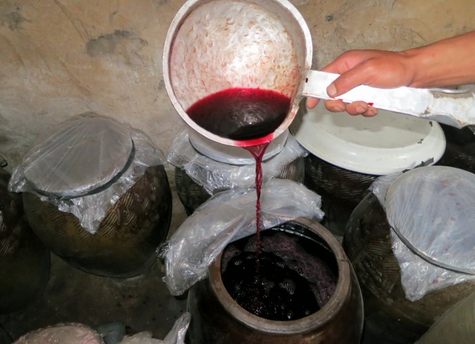 <b>Long awaited grape wine after a month of fermentation.</b>
<p>Third Step</p>
The liquid becomes the final wine product after the endeavors above and is stored in clay jars for storage, sale, and display. Typically, it might be fermented enough and drunk and sold as early as 3-4 months after first being made. 
