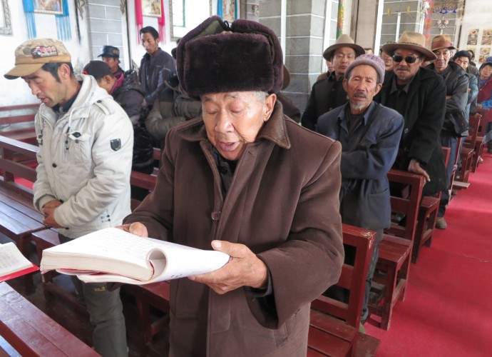 <b><p>An 86-year old devout catholic elder and local historian who used to assist the French and Swiss fathers before the 1950s.</b></p>
Most households are engaged in the practice of winemaking, and keep vineyards and small cellar spaces in their homes. Cizhong wine is purely handmade using simple techniques. It is a rural household industry using some techniques whose earliest historical references can be traced back to the Catholic missionaries over a hundred years ago. The original use of wine in Cizhong was purely ritual-based; for mass in the village church. As one village elder who studied with the French and Swiss missionaries prior to the 1950’s and is now renowned as a local historian has stated: 
<p><p><em>
Wine is important to local culture because it is needed for Catholic mass, and this ritual can’t take place without wine. Wherever there is a church there is a vineyard; wine is not for play, it is for ritual. The French brought grapes overland from Vietnam, Nepal, and Tibet. These fathers traveled and brought grapes and wine to Sichuan and Tibet earlier before their arrival in Cizhong.</em></p></p>