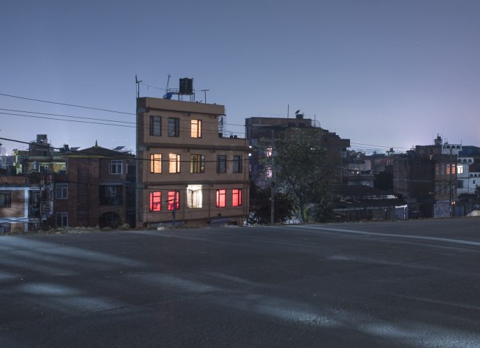 A house at night with the lights on, near Ring Road. (Kumar, December 1, 2016).