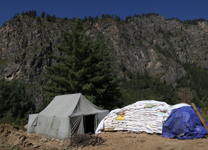 Salli Khola, October 2017.
Among other signs of underdevelopment, Humla has long been a designated food deficit district—a somewhat suspect label used to categorize districts that do not produce enough grain to meet an average dietary need. Tsewang Lama, a local politician and Humla’s first member of parliament, described how the whole idea of a food crisis can in fact be reduced to a ‘rice crisis’ originating from, and reinforced by, the aid of the very actors engaged in mitigating the so-called food crisis in Karnali. Sample household surveys conducted by the authors of commodities purchased by each household suggest that white flour is the most imported food product from China. With the construction of motorable roads from China and increased dependence on Chinese goods, there could be a ‘white flour crisis’ looming, especially in the event of border restrictions and/or seasonal closure of roads. On this point, Tashi Lama, 52, from Yalbang comments, “earlier it was rice that made us poor, now it is Chinese white flour.”