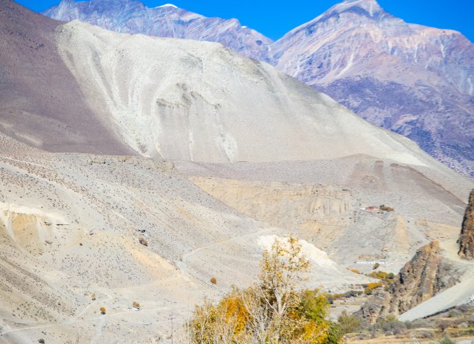 Fields. (Kory Thibeault, October 2016)
Agricultural production over the past few decades has decreased due to climate change and the outmigration of many residents in Lower Mustang. Youth are leaving for educational and employment opportunities abroad, and there is a shortage of labor within villages. This photo was taken right after the harvesting season concluded, as community members pray for a productive harvest next season.
