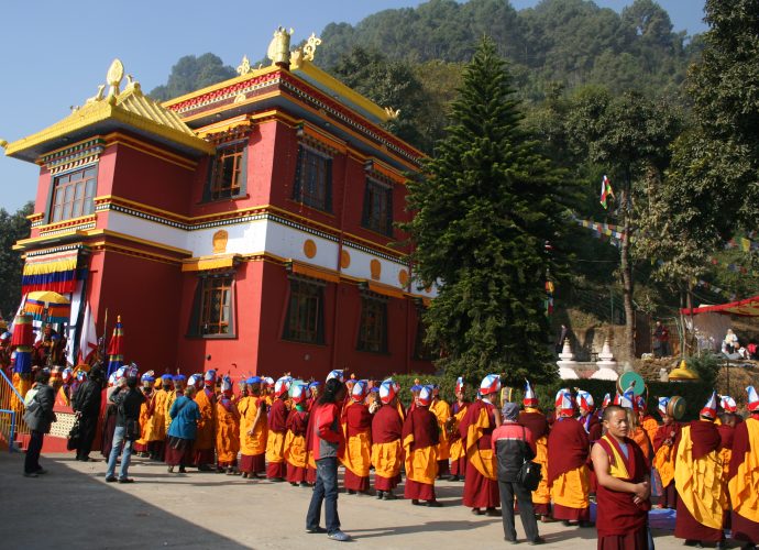 Triten Norbutse monastery in December 2012 during the Light-Swirled Mendrup celebration. A ceremonial procession of monks leads to one of the venues within the monastic compound where the individual parts of the ritual were performed. About one thousand people witnessed and took part in the ritual, and, most importantly, received the consecrated mendrup medicine.