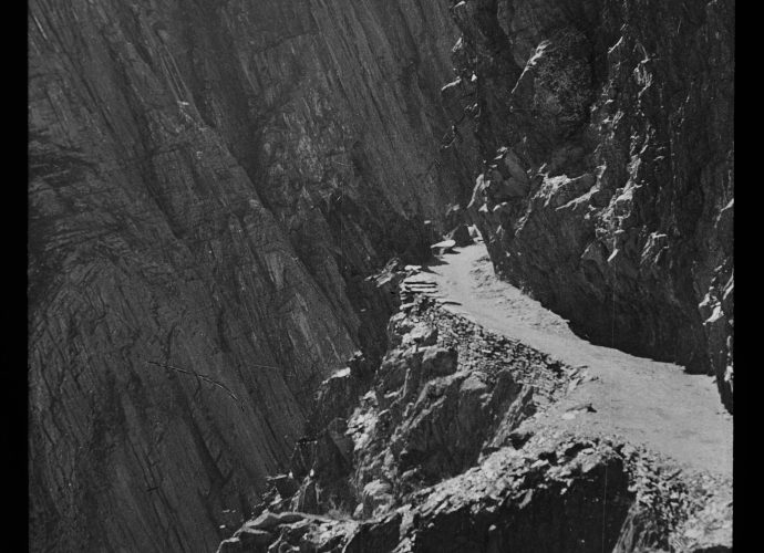 The Zoji La is the mountain pass that connects—or separates—the Kashmir Valley and the Dras region of Ladakh. At 3,500m it is relatively low by Himalayan standards, but it is notorious for heavy snow in winter. Even today it is closed to traffic for several months a year.
This picture, which was taken near the western end of the pass, illustrates its precipitous nature. It also points to the effort that was required to maintain the road in the face of regular landslides. Successive British Joint Commissioners spent the summer months in Ladakh from 1871 to 1946 and, together with the Kashmir authorities, they shared responsibility for maintaining what was then one of the main arterial routes from the Indian plains to Central Asia (Rizvi 1999).
The journey from Srinagar to Leh took approximately two weeks. From there the road continued to the north over the Karakoram mountains to Yarkand, Khotan and Kashgar in what was then known as Chinese Turkestan, now Xinjiang.